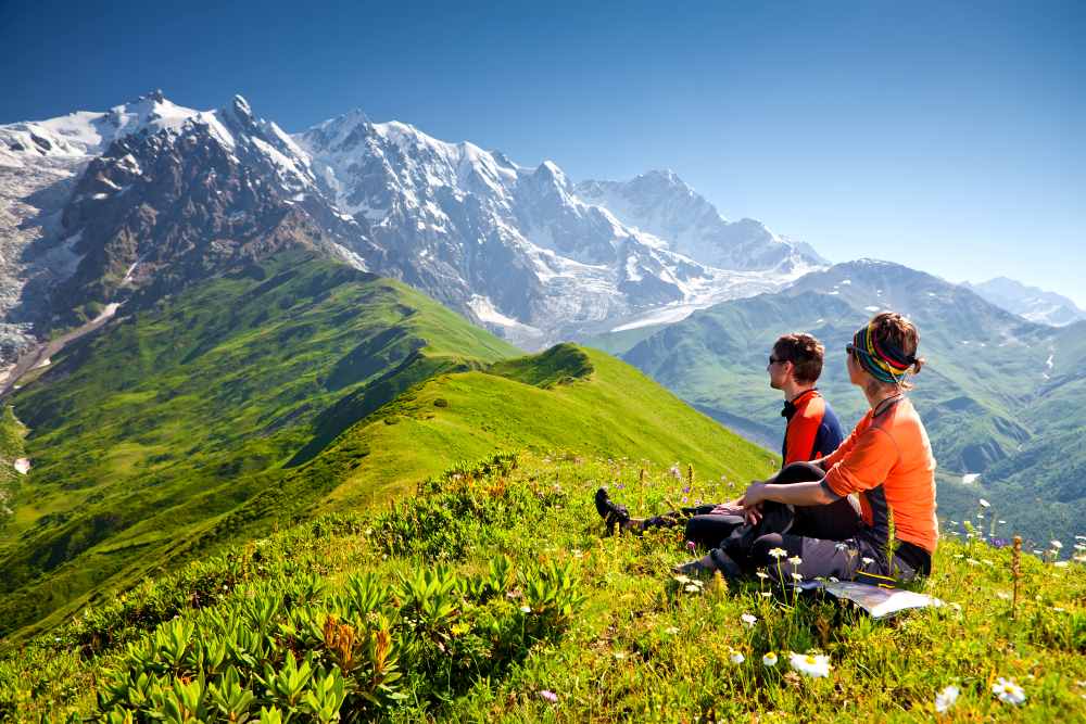 romance_couple_hiking_Caucasus_mountains_Georgia_125437775